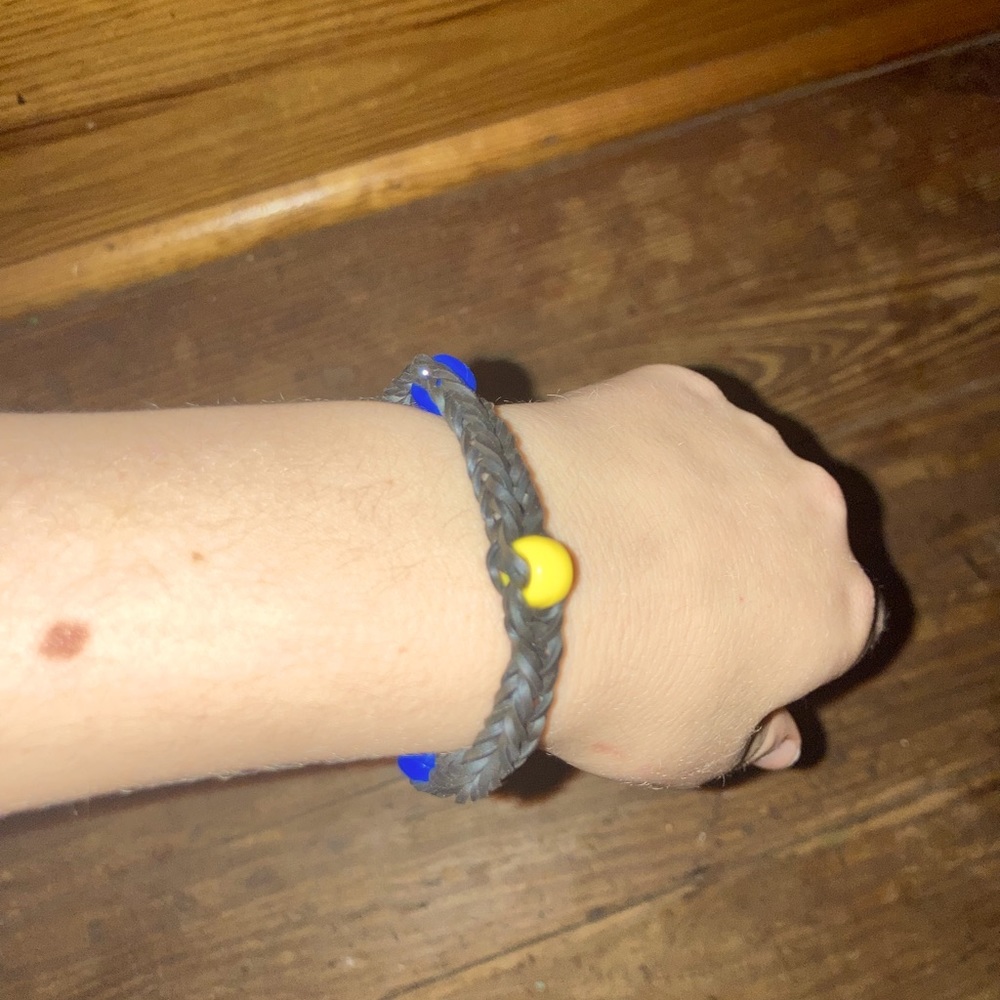 Blue and yellow beads.                       Black rubber bands
